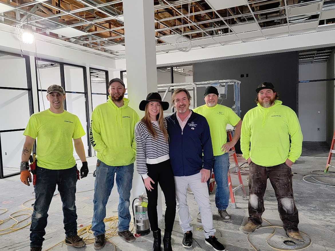 Berkshire Hathaway HomeServices owners Nicole and Wade Jacklin with the crew creating the new Riverstone office