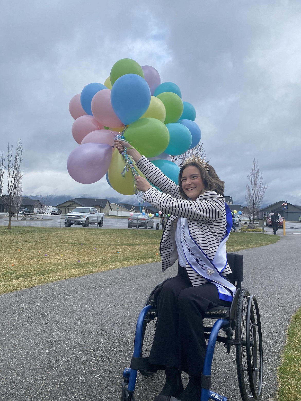 Ms. Wheelchair Idaho 2022, Jessica Bellefeuille prepares to kick off the second annual Village Bakery inclusive Easter egg hunt, Saturday at Majestic Park in Rathdrum.