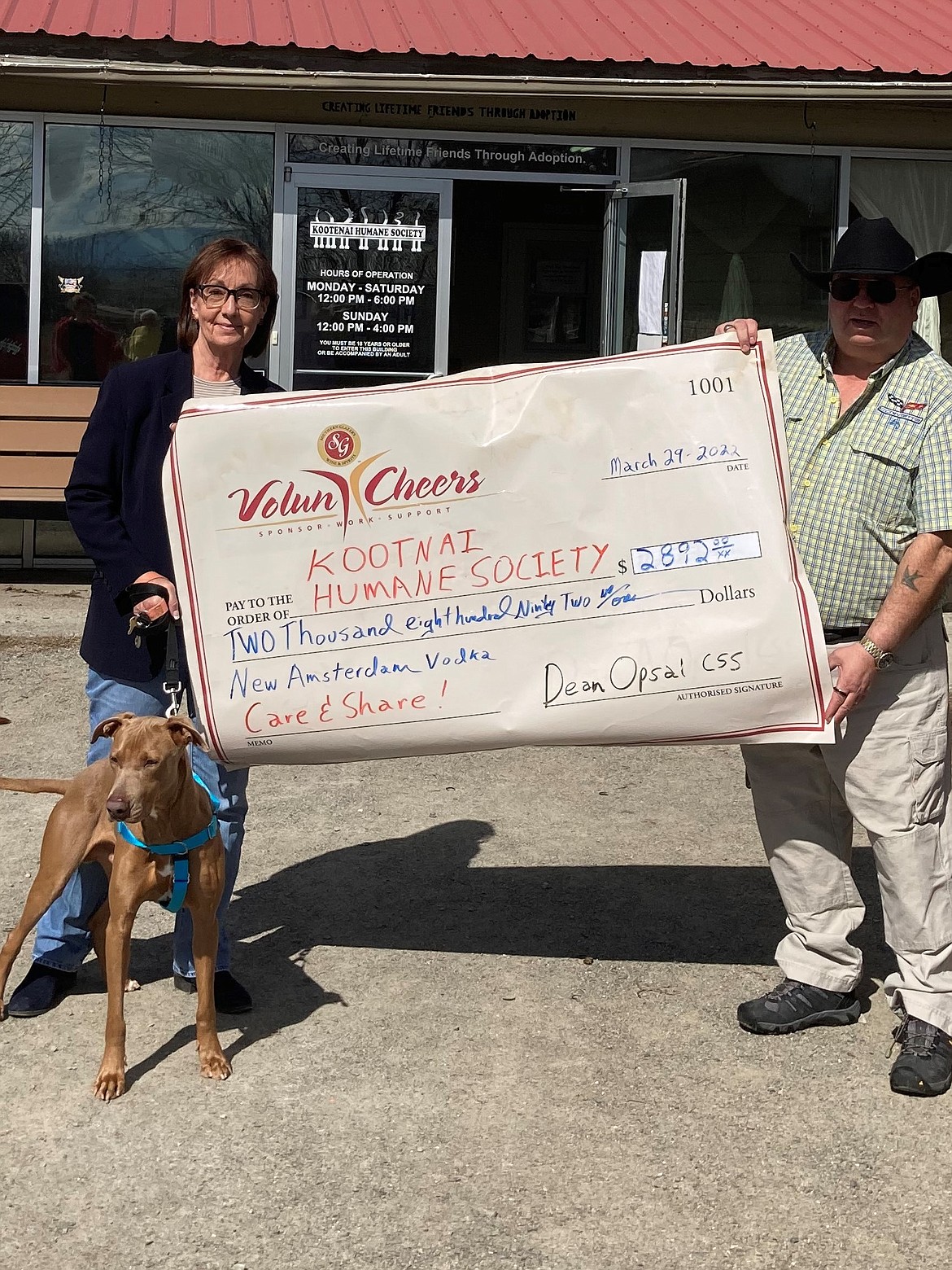 The Kootenai Humane Society received a donation of $2,892 from Southern Glazers Wine & Spirits and Gallo Spirits for the Care & Share Program 
conducted in January and February. Vicky Nelson Development, director of KHS and Dean Opsal, CSS sales Representative and Volun-Cheers Ambassador for SGWS of Idaho.