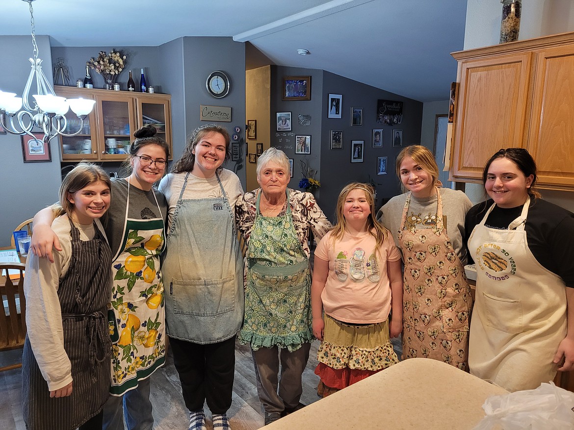 Members of the Round Mountain Ryders 4-H Club, the Kootenai/Shoshone 4-H Program's club of the year, learn how to make noodles. From left: Alycia Cameron, Bernie Carhart, Ally Shell, cooking helper Georgia Carhart, Molly Swanson, Lily Carhart and Isabel Alapai.