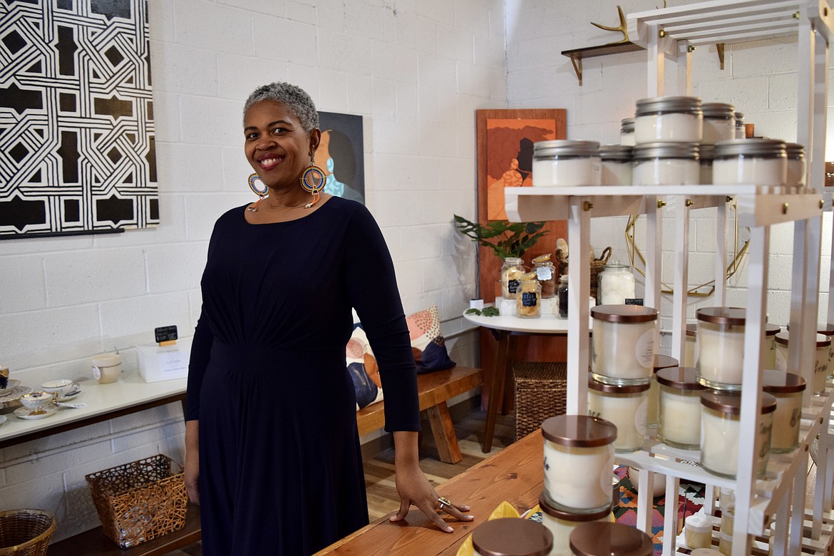 Soap and candle maker Angela Clay with some of her wares inside her new storefront, Liberate & Lather, one of five new businesses located in the Downtown Moses Lake Association’s new business incubator the Obra Project, which formally opened its doors last Saturday.