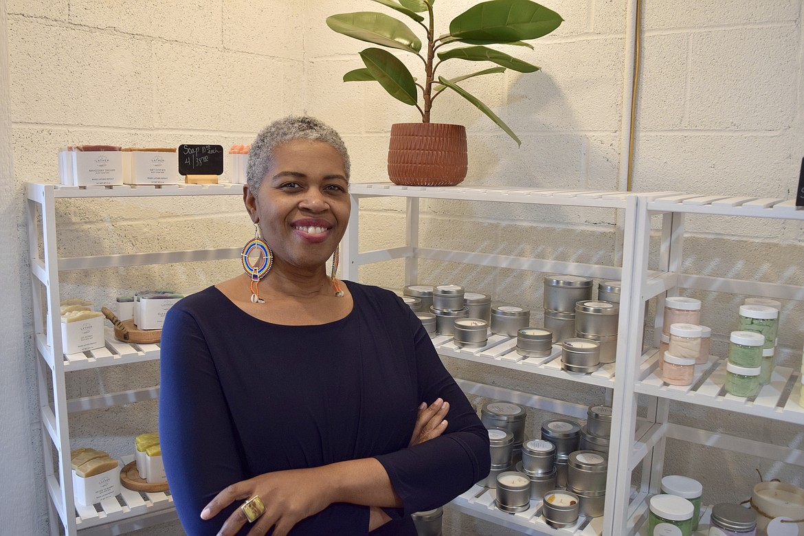 Soap and candle maker Angela Clay with some of her wares inside her new storefront, Liberate & Lather, one of five new businesses located in the Downtown Moses Lake Association’s new business incubator the Obra Project, which formally opened its doors last Saturday.