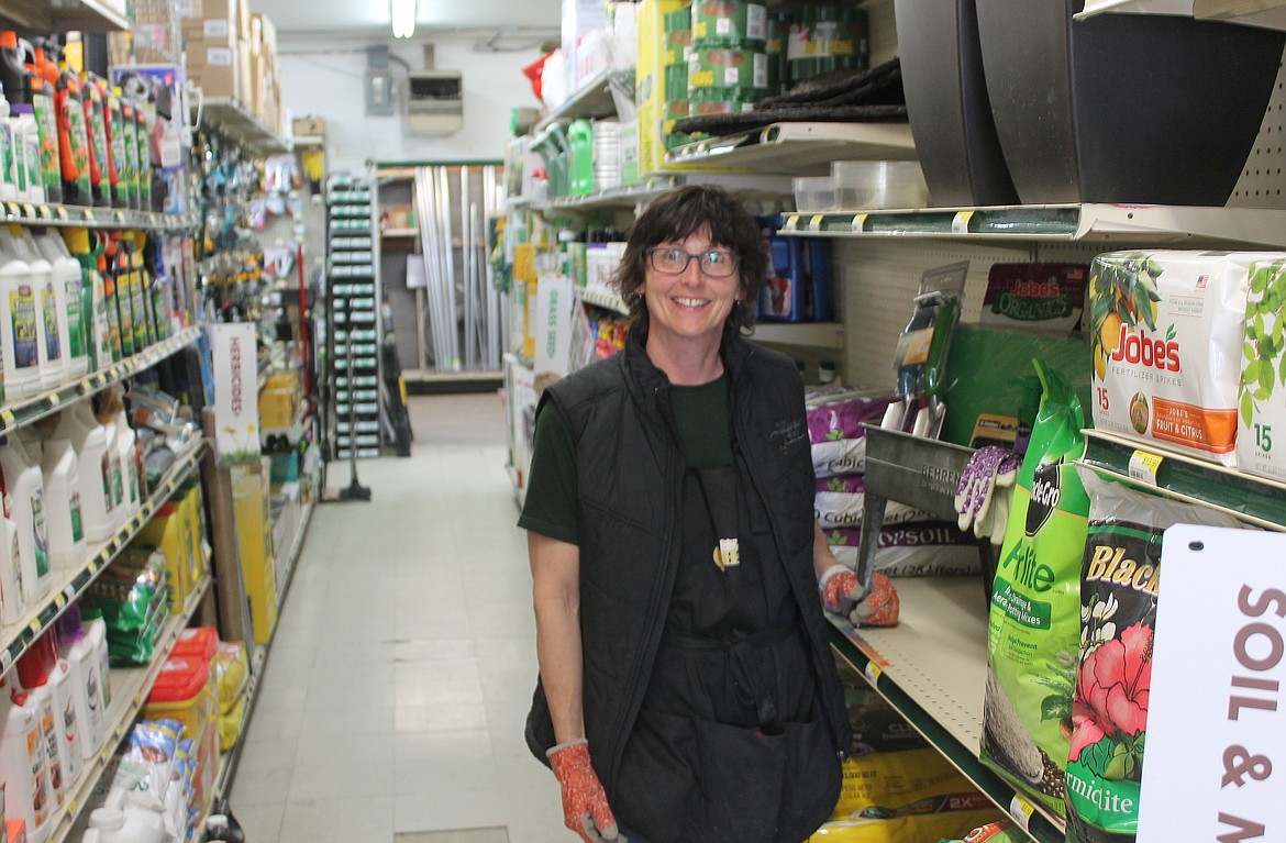 Jenny Harwood, gardening associate at Quincy Hardware and Lumber, stands in the store’s gardening section. Harwood said now is the time to start planting vegetables that can handle slightly cooler temperatures. These include things like peas, lettuce and onions.