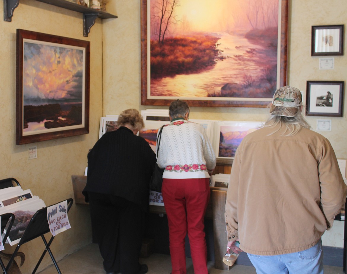 Attendees at the April Fools Art Walk check out the offerings at Cariboo Trail Studio in Coulee City April 1.