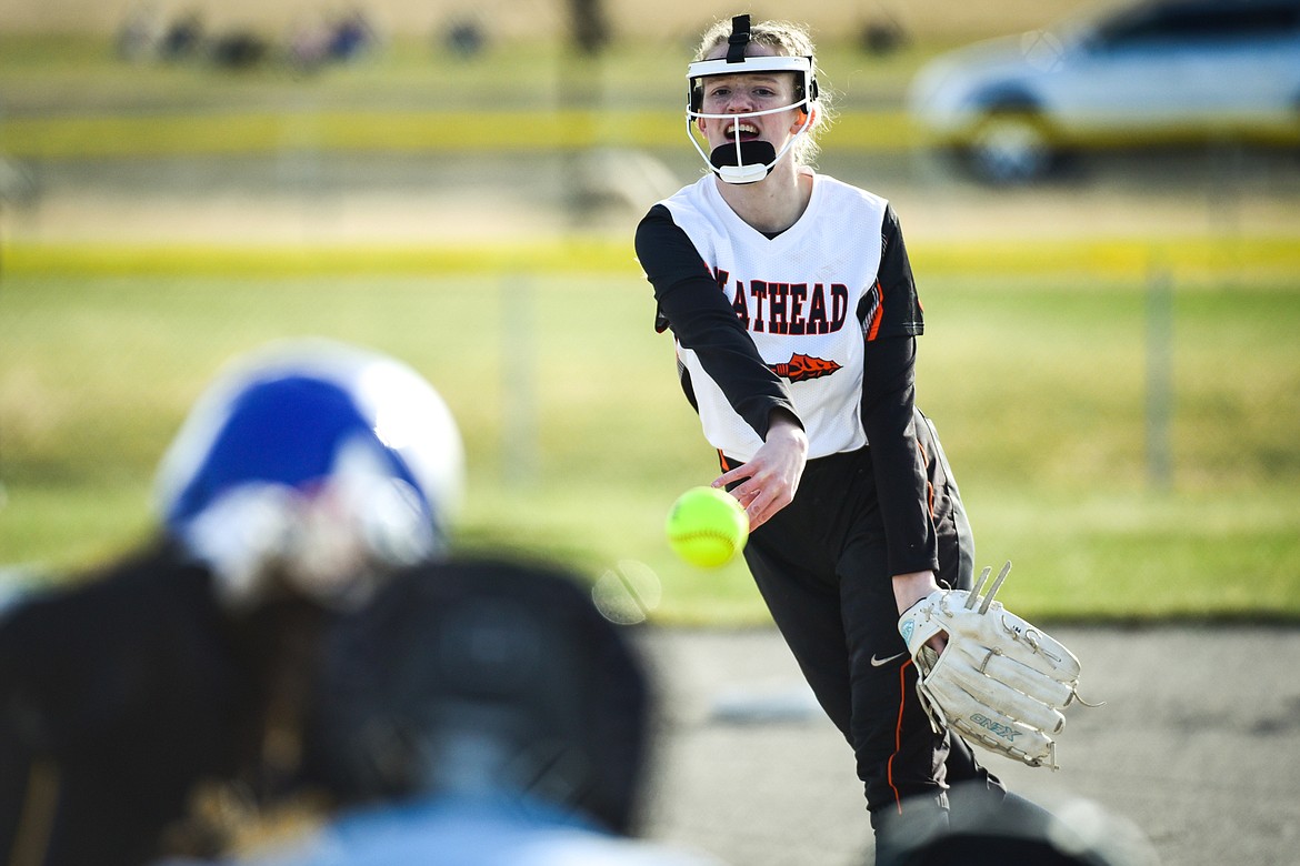 Flathead pitcher Lacie Franklin (22) delivers to a Libby batter at Kidsports Complex on Thursday, April 7. (Casey Kreider/Daily Inter Lake)