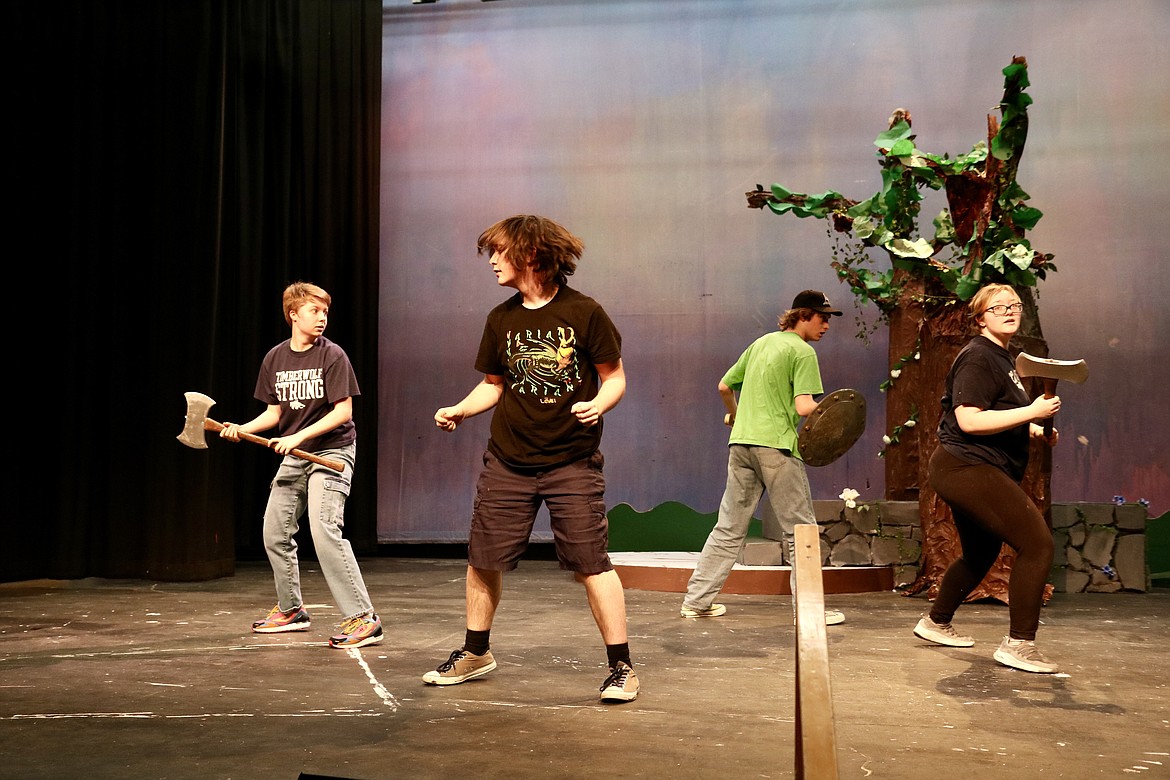 Lake City High School students from left, Emma Inwood, Scott Wilde, Luke Sharon and Alex Jones play the roles of knights and ensemble in the school's upcoming production of "Cinderella: Broadway Version" opening on Thursday. HANNAH NEFF/Press