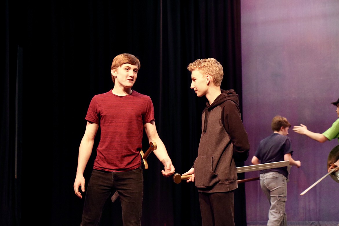 From left, Lake City High School students Wyatt Matthews, playing Prince Topher, and James Normington, playing Sebastian, rehearse for the upcoming performance of "Cinderella: Broadway Version" opening on Thursday at the school. HANNAH NEFF/Press