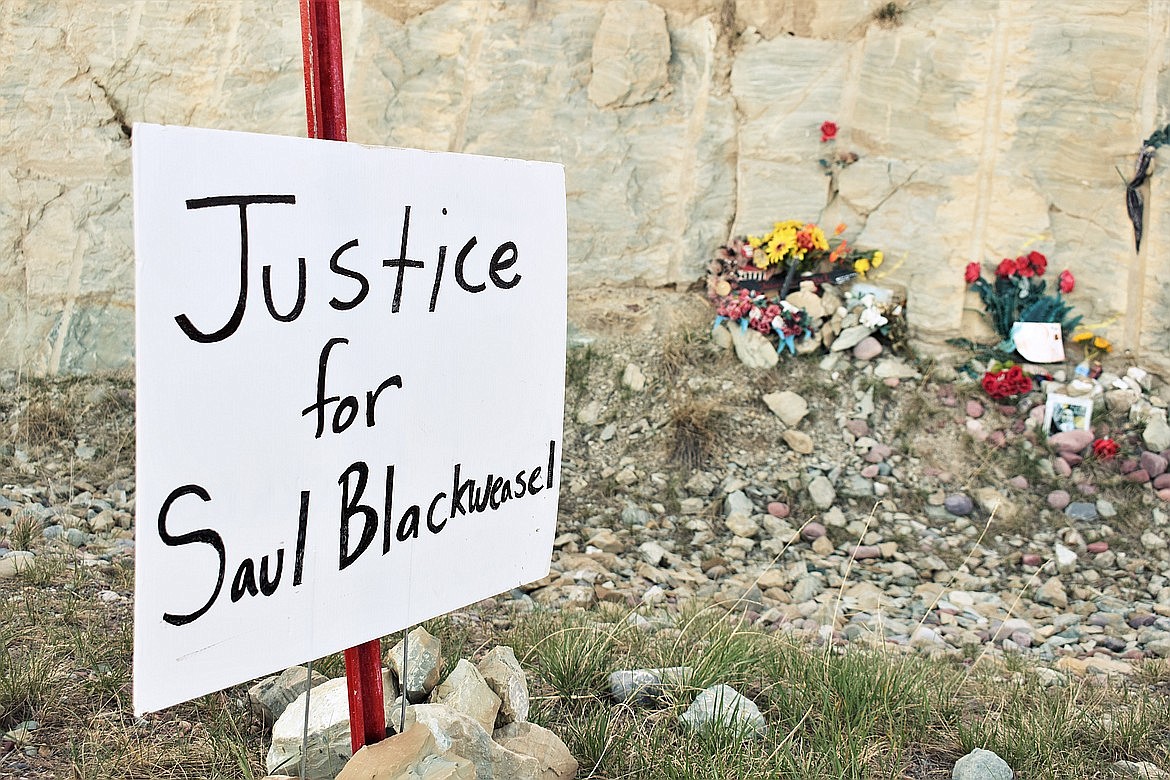 A memorial has been created near the site of a crash where Saul Blackweasel died in January 2021. (Emily Lonnevik/Lake County Leader)