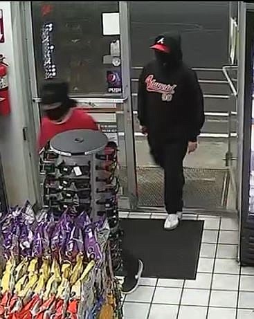 Moses Lake Police are looking for two suspects who stole beer from a convenience store, then pulled a gun on the clerk Wednesday night.