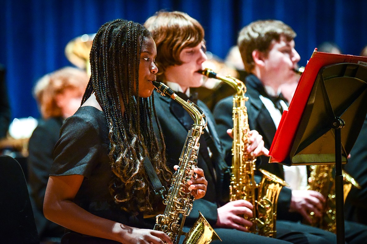 Saxophonists Abigail Bergstedt, Kalen Thompson and Sam Stinson perform during the Glacier High School Varsity Band's performance at the District Music Festival at the high school on Friday, April 8. (Casey Kreider/Daily Inter Lake)