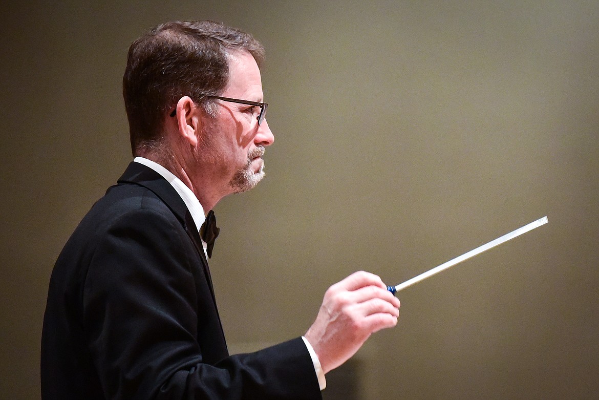 David Barr, Director of Bands at Glacier High School, conducts for the Varsity Band during the District Music Festival at the high school on Friday, April 8. (Casey Kreider/Daily Inter Lake)