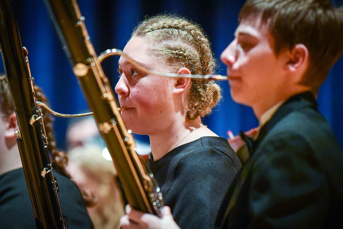 Kai Johnson, left, and Dalyn Mathison play the bassoon in Glacier High School's Varsity Band at the District Music Festival at the high school on Friday, April 8. (Casey Kreider/Daily Inter Lake)