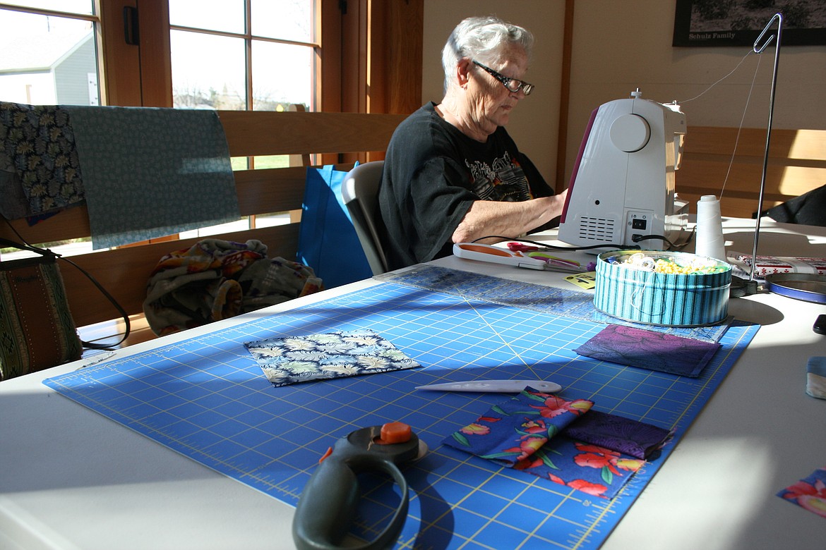 With tools close at hand, Carolyn Dudley works on a quilting project. Dudley said she came to Community Sew Day, sponsored by the Quincy Valley Historical Society and Museum, to meet new people and have some fun.