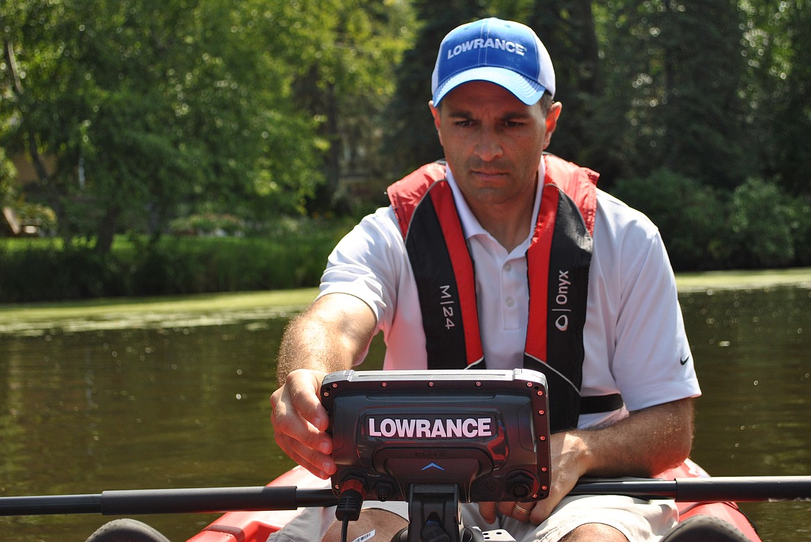 Ray Valley, development manager for BioBase, uses a  Lowrance Elite Ti2 fish-finder to collect data. Volunteers in the Hayden Lake mapping project will use fish-finder sonar devices to collect the data needed for a bathymetric map of Hayden Lake. Photo courtesy of Ray Valley