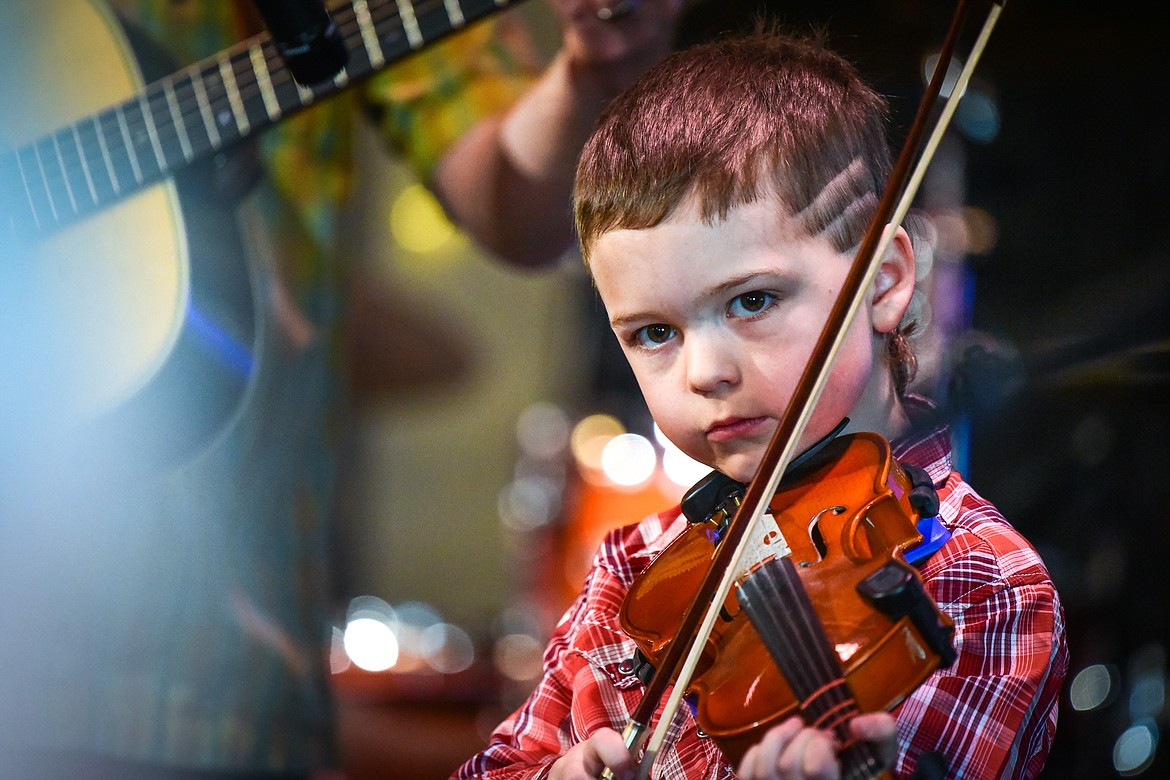 Hartford Coyle performs in the pee wee age division final round at the 12th annual Glacier Fiddle Festival at Cornerstone Community Church in Kalispell on Saturday, April 9. (Casey Kreider/Daily Inter Lake)