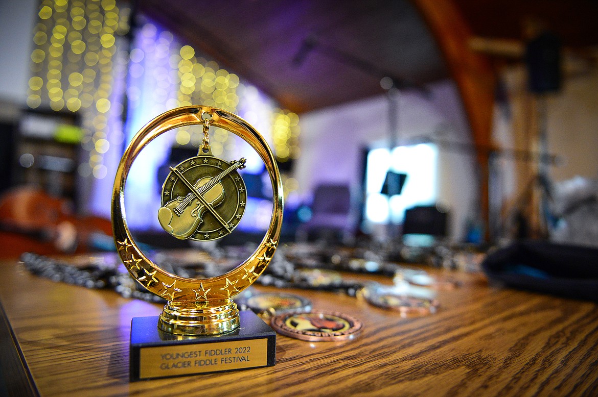 Trophies for youngest and oldest fiddler as well as medals for 1st, 2nd and 3rd place in junior, adult, no holds barred, theme song, champion, picking and accompanist at the 12th annual Glacier Fiddle Festival at Cornerstone Community Church in Kalispell on Saturday, April 9. (Casey Kreider/Daily Inter Lake)
