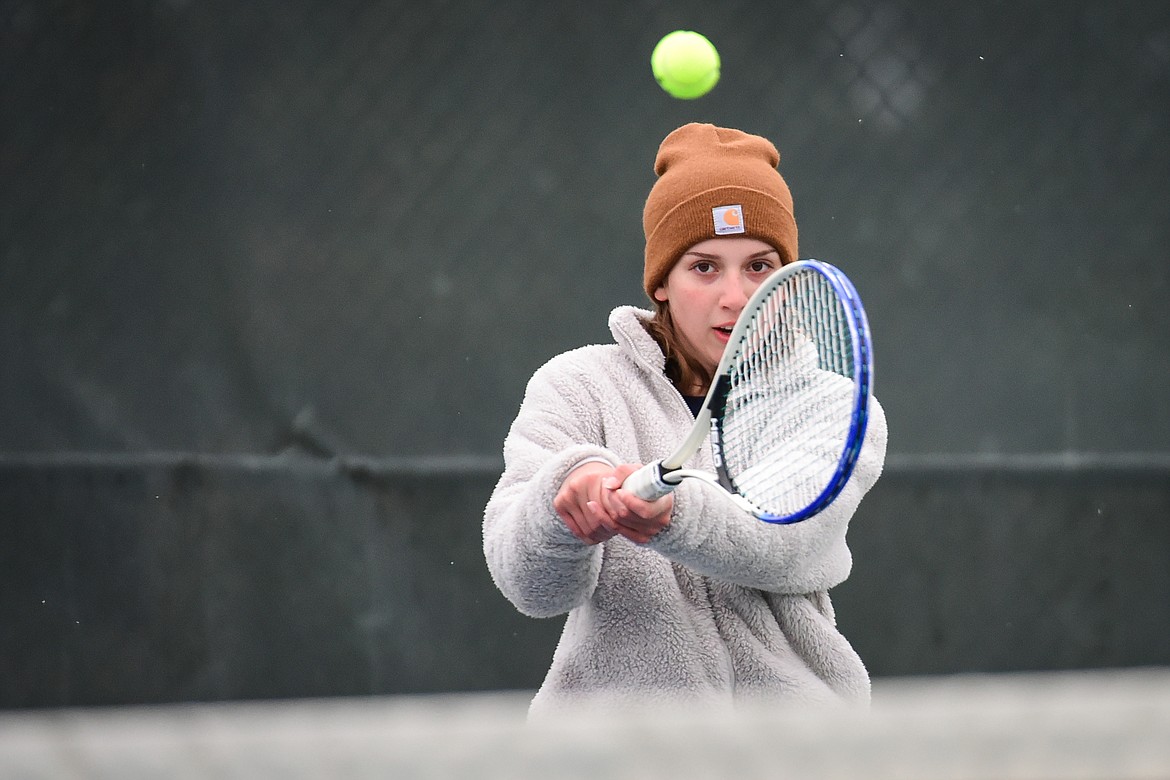 Glacier's Naomi Jutzi hits a return against Missoula Sentinel's Berlyn Sonnenberg at Flathead Valley Community College on Saturday, April 9. (Casey Kreider/Daily Inter Lake)