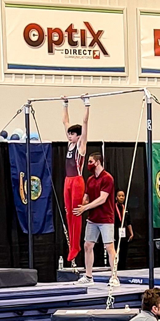 Courtesy photo
Avant Coeur Gymnastics Level 9 boy Grayson McKlendin with coach Matthew Auerbach at the regional championships in Pocatello. Grayson qualified for Western Nationals in Reno, Nev., on May 1.