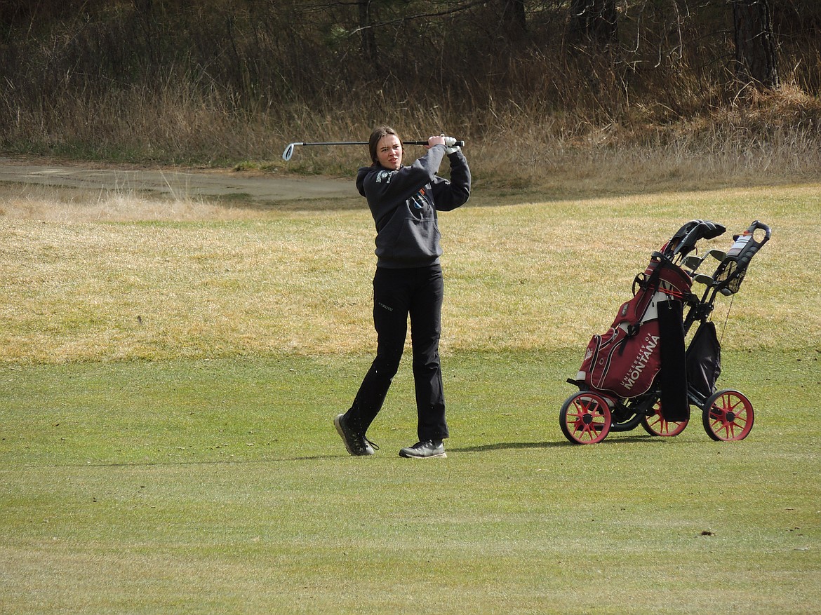 Thompson Falls golfer Ellie Baxter puts the ball in play during Friday's first day of the Libby Invitational this past Friday. (Chuck Bandel/Valley Press)