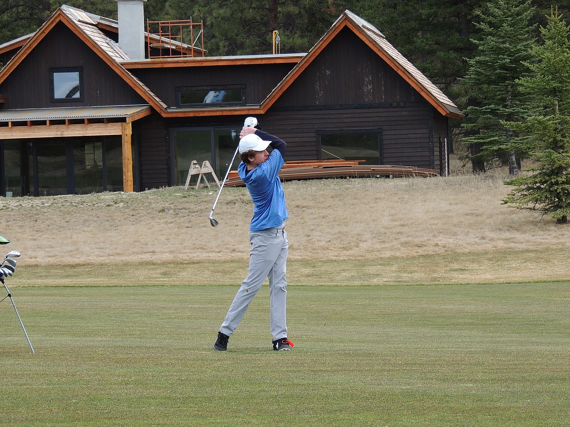 Thompson Falls golfer Gentry Beach takes a big swing during the opening day of the Libby Invitational Golf Tournament this past Friday and Saturday in Libby. The T-Falls team did not participate Saturday due to what coach Doree Thilmony said were brutal weather conditions. (Chuck Bandel/VP-Mi)