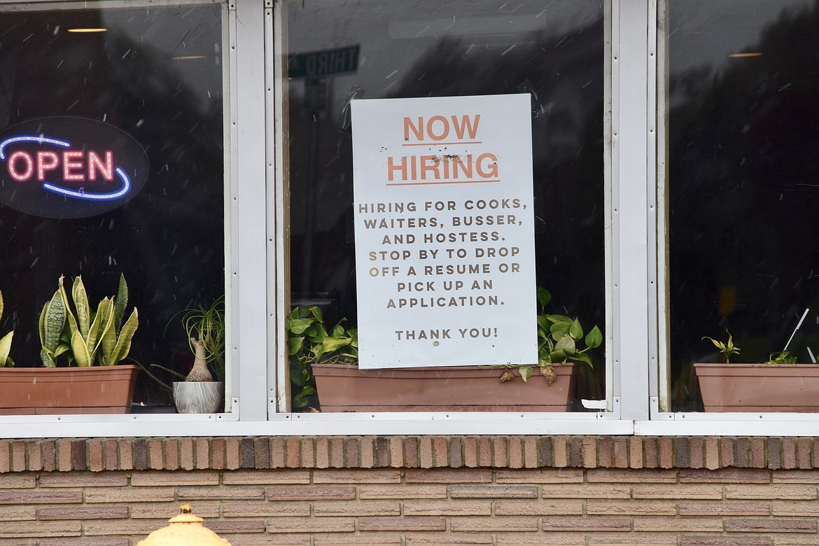 A help wanted sign is posted in the window at Inca Mexican Restaurant at 404 E. 3rd Ave. in downtown Moses Lake. Many businesses are hiring and unemployment in non-farm positions is markedly down from this same time last year, according to a Washington State Employment Security Department report.