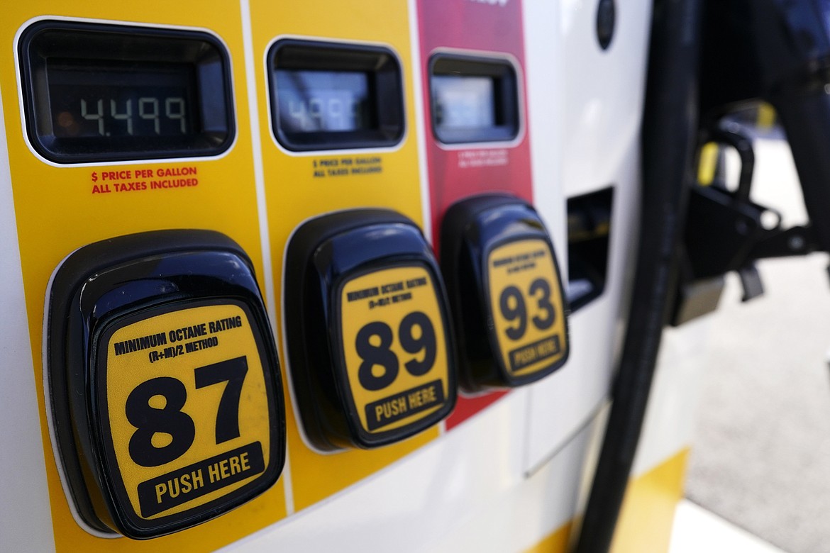 Gasoline prices are displayed at a gas station in Vernon Hills, Ill., Friday, April 1, 2022. Inflation soared over the past year at its fastest pace in more than 40 years, with costs for food, gasoline, housing and other necessities squeezing American consumers and wiping out the pay raises that many people have received. (AP Photo/Nam Y. Huh)