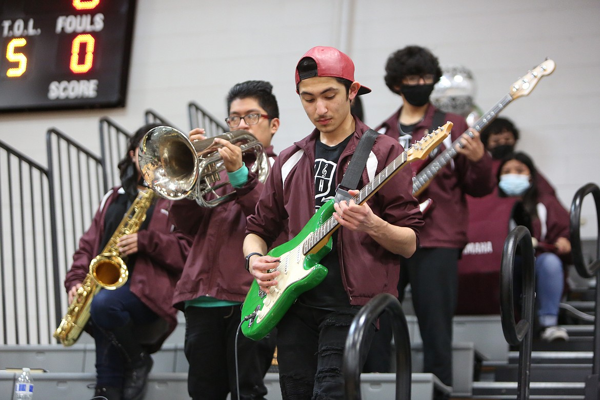 Wahluke High School pep band members Noel Virgen (left) and Richie Torres (right) play during a Jan. 14 basketball game. The pep band is one of the programs funded in part through the educational programs and operations levy, often referred to as EP&O.