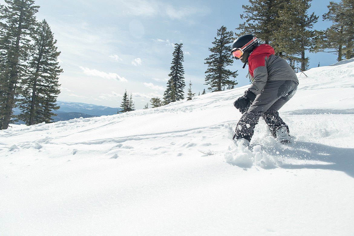 A "seed" finds some fresh powder at Whitefish Mountain Resort earlier this season. (Jeff Hawe/Workhat Media)