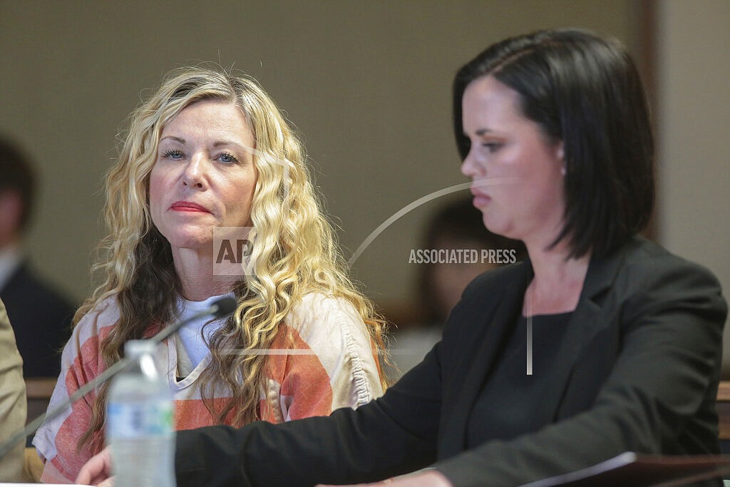 Lori Vallow Daybell glances at the camera during her hearing on March 6, 2020, in Rexburg, Idaho. A judge says a mom accused of conspiring to kill her children, her estranged husband and a lover's wife is now mentally competent to stand trial on some of the charges in Idaho. Judge Steven Boyce issued an order on Monday, April 11, 2022, saying that Lori Vallow Daybell "is restored to competency and is fit to proceed" in the Idaho murder case. (John Roark/The Idaho Post-Register via AP, Pool, File)