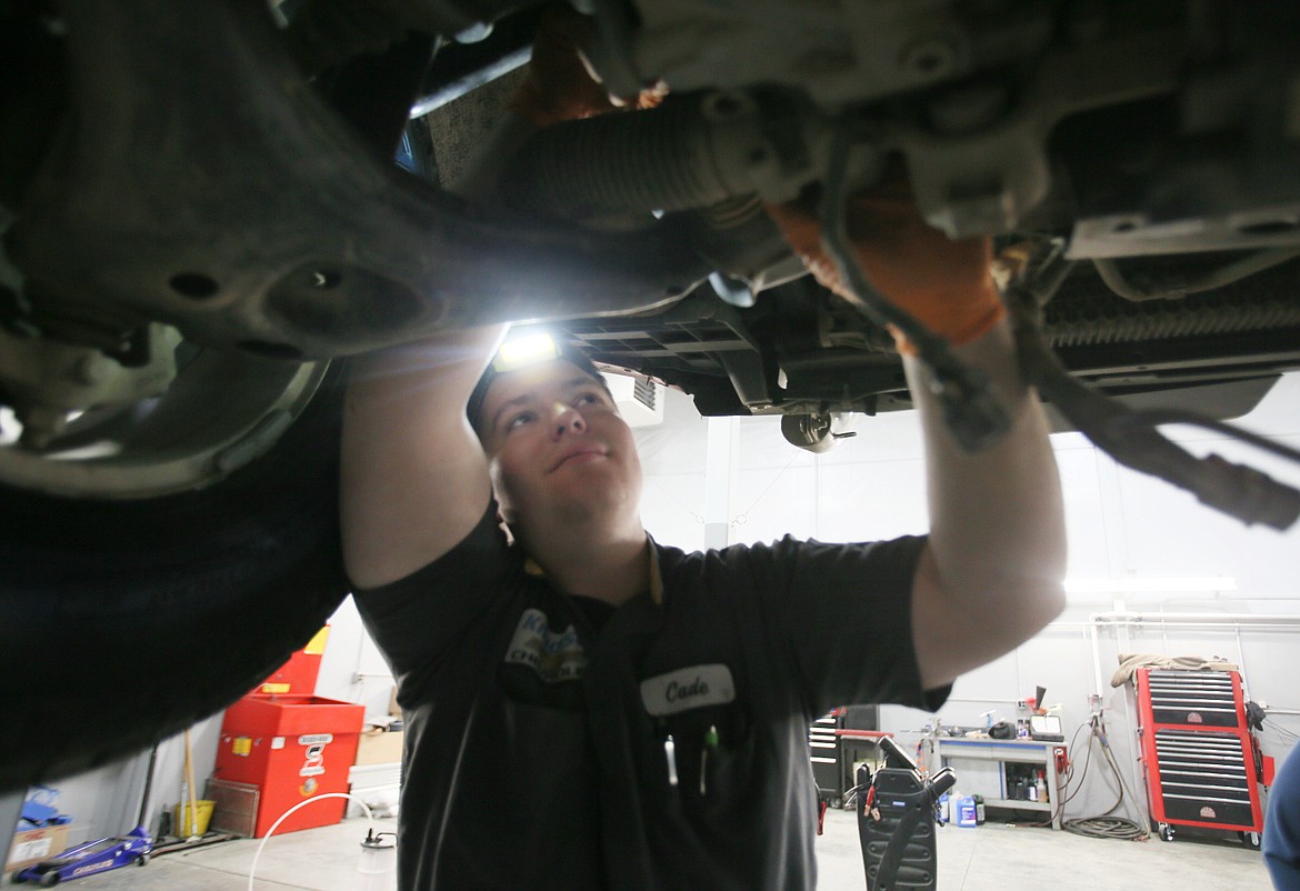 Cade Conboy, 20, of Athol, corrects a power steering recall issue on a Chevy Colorado at Knudtsen Chevrolet.