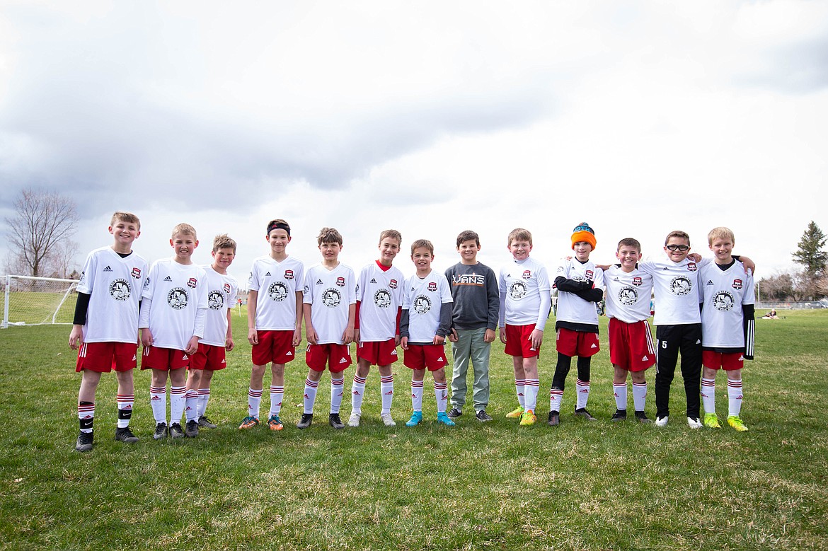 Photo courtesy BUSCEMA PHOTOGRAPHY
The Timbers North FC 11 Boys soccer team played host to NSC Montana on Saturday and Sunday. The Timbers fell short in Saturday’s game with the team’s goal scored by Charlie McVey, assisted by Ryder Quinn. The Timbers rallied on Sunday with a 2-1 win over NSC. Goals were scored by Lucas Buscema and Kannon Foreman. The Timbers travel to Spokane this Saturday for two games against the Spokane Scotties and Spokane Sounders. Pictured from left are  Kannon Foreman, Kellan Alexander, Owen Newby, Lucas Buscema, Oliver Peters, Ryder Quinn, Charlie McVey, Nolan Rice, Eli Nail, Damon Mysse, Ryder Benca, Kolby Johnson and Bode Barton.