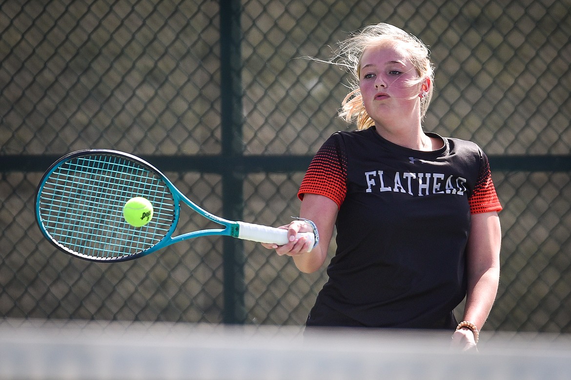 Flathead's Patricia Hinchey hits a return against Glacier at Flathead Valley Community College on Thursday, April 14. (Casey Kreider/Daily Inter Lake)