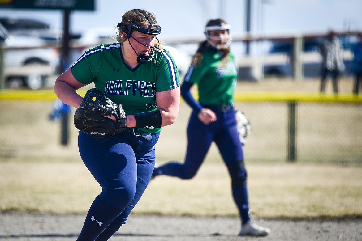 Glacier first baseman Teagan Powell (18) fields a grounder and heads to first for the putout against Helena Capital at Glacier High School on Friday, April 15. (Casey Kreider/Daily Inter Lake)