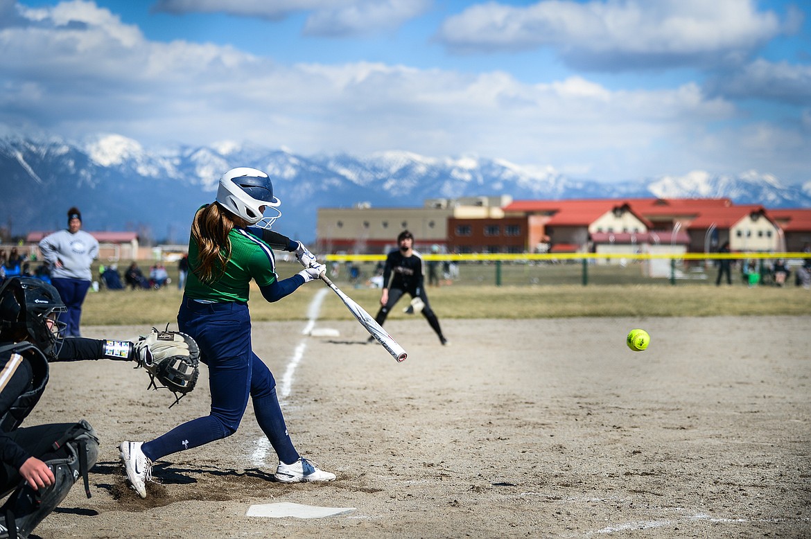 Glacier's Sammie Labrum (1) connects on a single into right field in the third inning against Helena Capital at Glacier High School on Friday, April 15. (Casey Kreider/Daily Inter Lake)