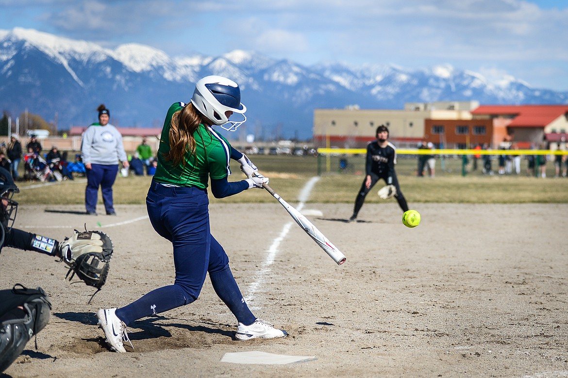 Glacier's Sammie Labrum (1) connects on a single in the fifth inning against Helena Capital at Glacier High School on Friday, April 15. (Casey Kreider/Daily Inter Lake)