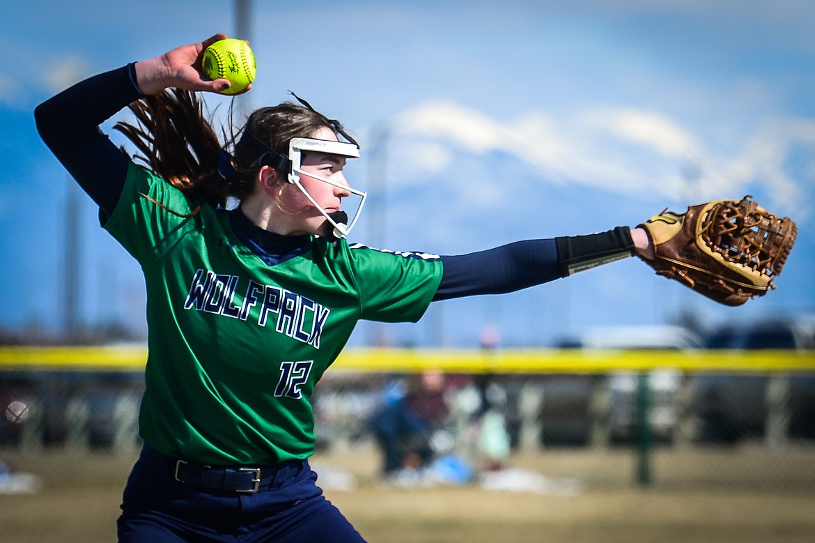 Glacier pitcher Ella Farrell (12) fires to first base after fielding a ground ball back to the mound against Helena Capital at Glacier High School on Friday, April 15. (Casey Kreider/Daily Inter Lake)