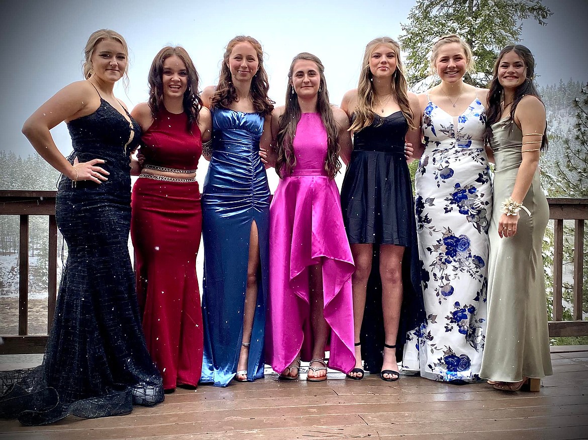 Following some finishing touches before Saturday night's prom, girls from Superior High School show off their gowns, (from left to right) Trinity Donaldson, Akasha Azure, Kylie Quick, Lanie Crabb, Maddie Drey, Cassie Green, and Brooke Bibler. (Photo courtesy/Summer Young Drey)