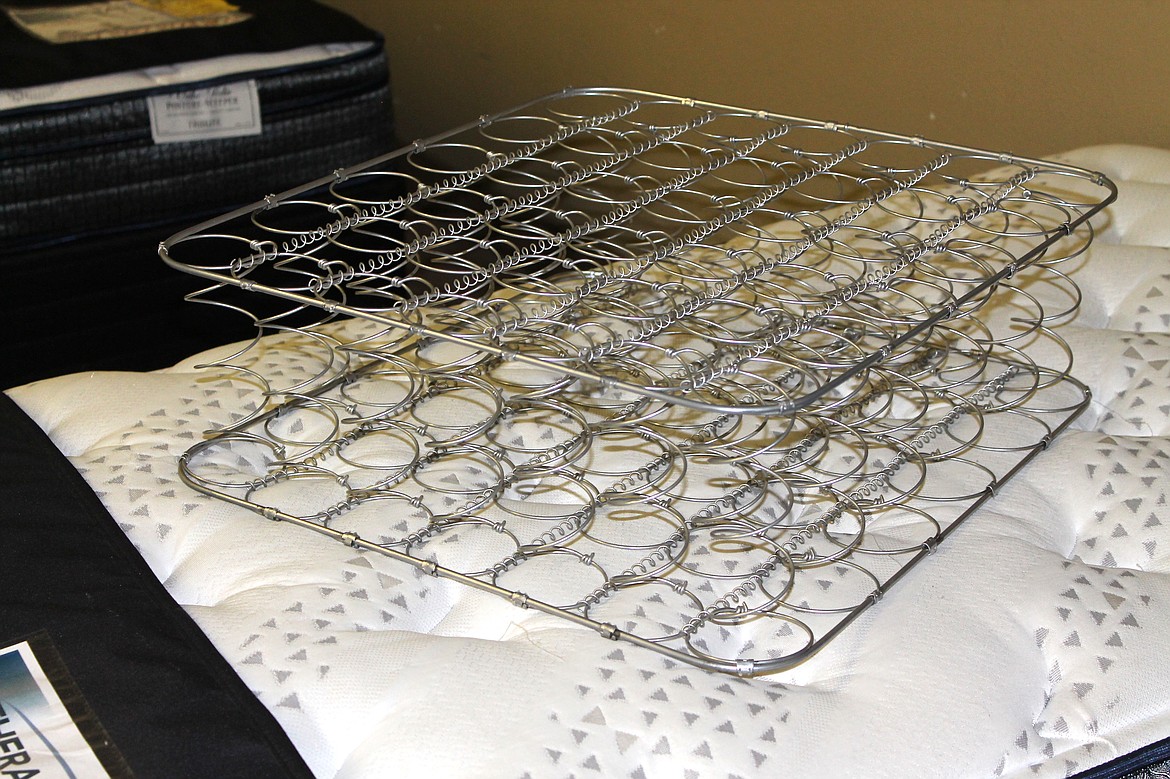 Mattresses that use springs, like the sample shown here, have more resilience than foam mattresses, and also better air flow to disperse body heat. Some consumers may find that a spring mattress supports them better than other options. It's often a matter of personal preference - not just cost.