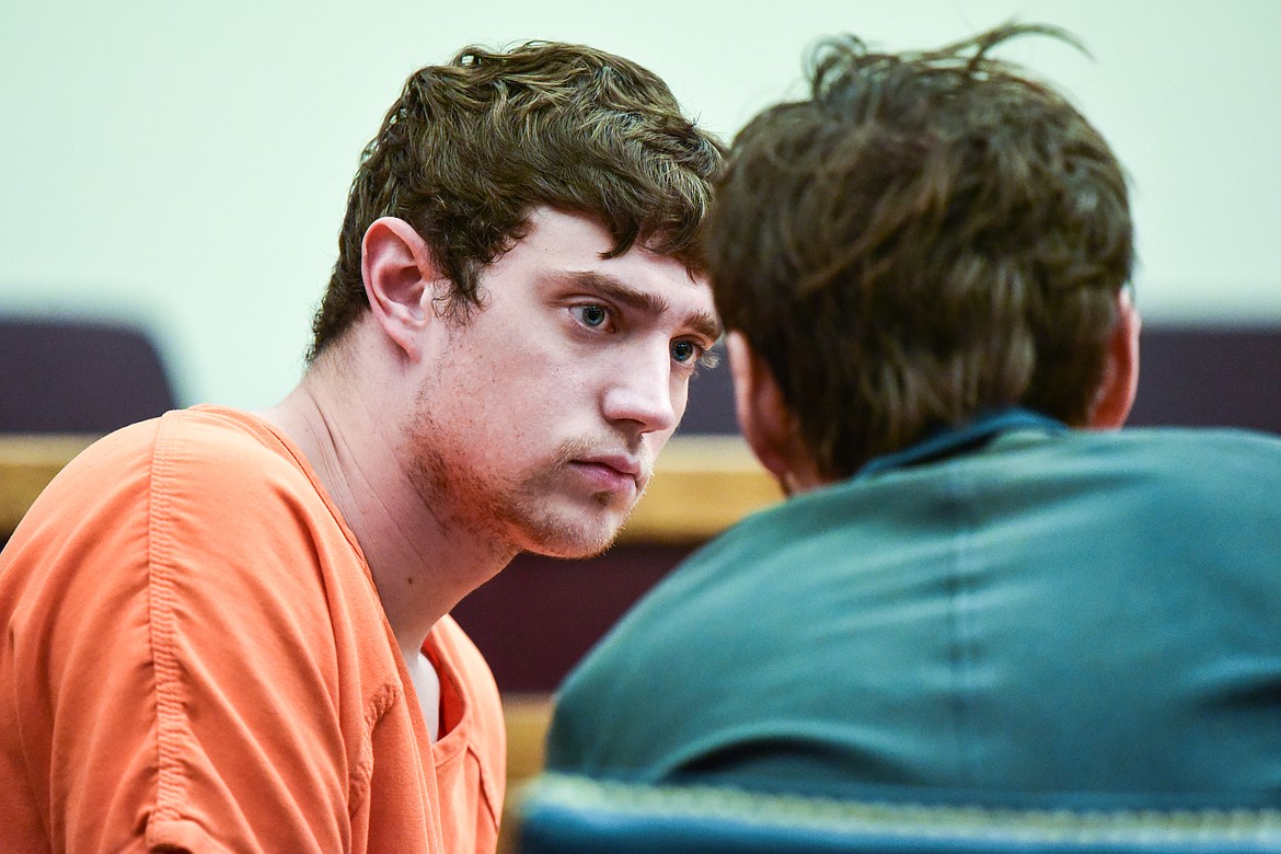 Zackary Maas speaks to his attorney at his arraignment in Flathead County District Court on Tuesday, April 19. (Casey Kreider/Daily Inter Lake)