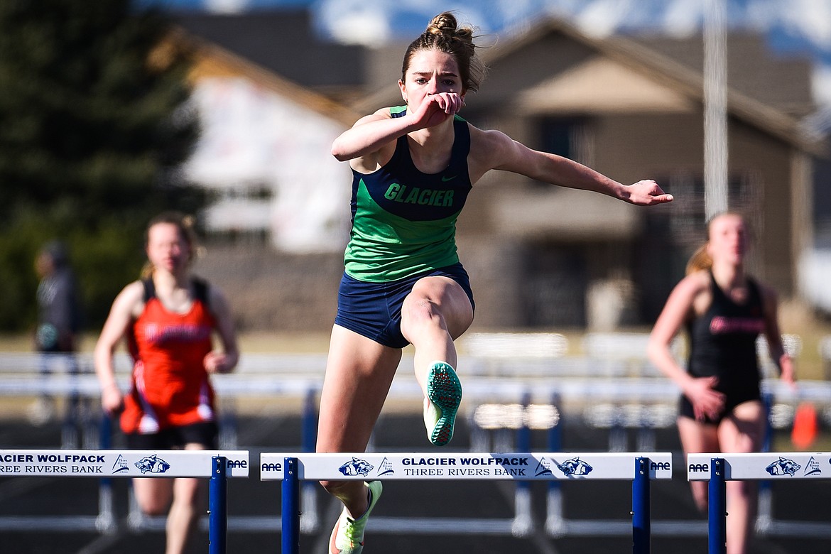 Glacier's Sidney Gulick competes in the girls 300 meter hurdles during a crosstown track and field meet at Glacier High School on Tuesday, April 19. (Casey Kreider/Daily Inter Lake)