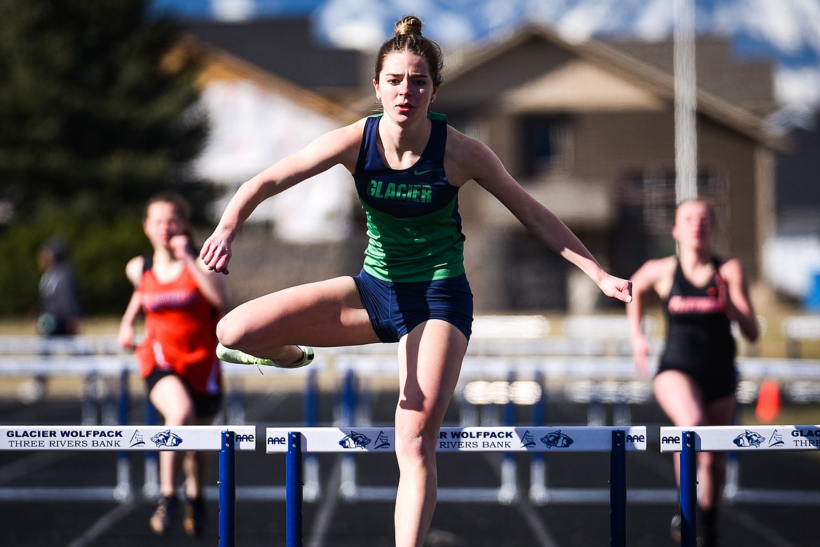 Glacier's Sidney Gulick competes in the girls 300 meter hurdles during a crosstown track and field meet at Glacier High School on Tuesday, April 19. (Casey Kreider/Daily Inter Lake)