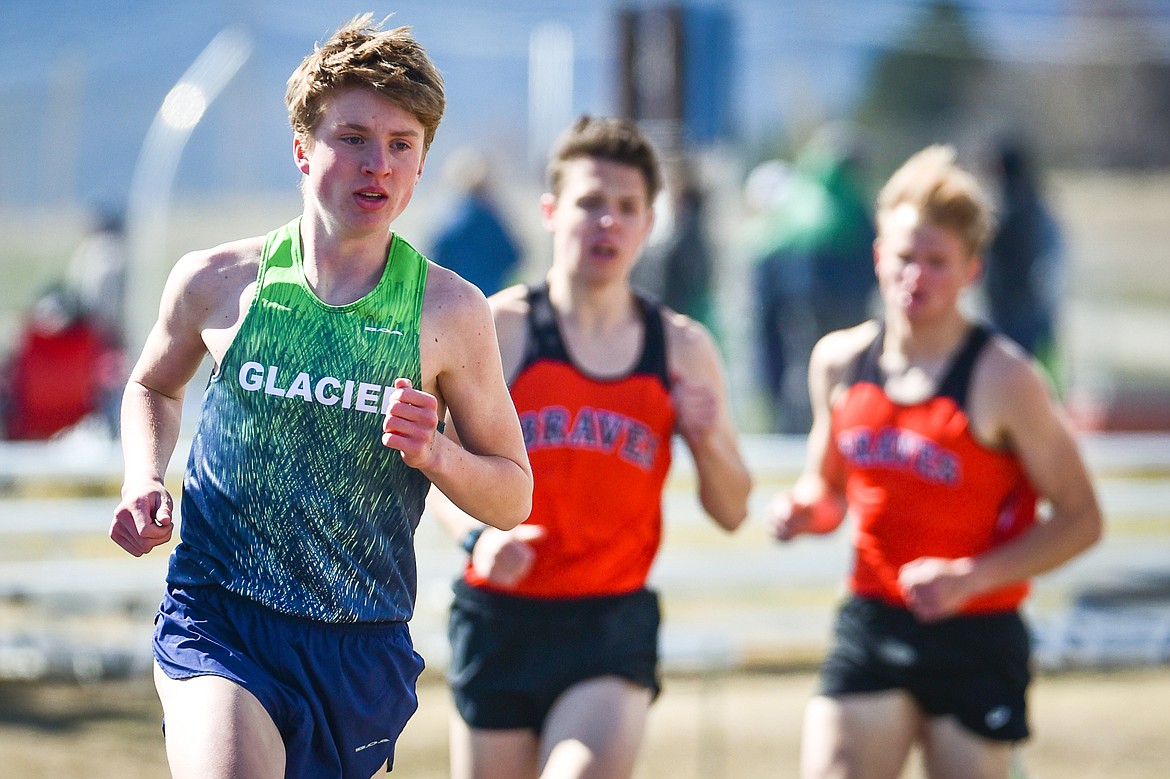 Glacier's Sam Ells leads the boys 1600 meter run during a crosstown track and field meet at Glacier High School on Tuesday, April 19. (Casey Kreider/Daily Inter Lake)