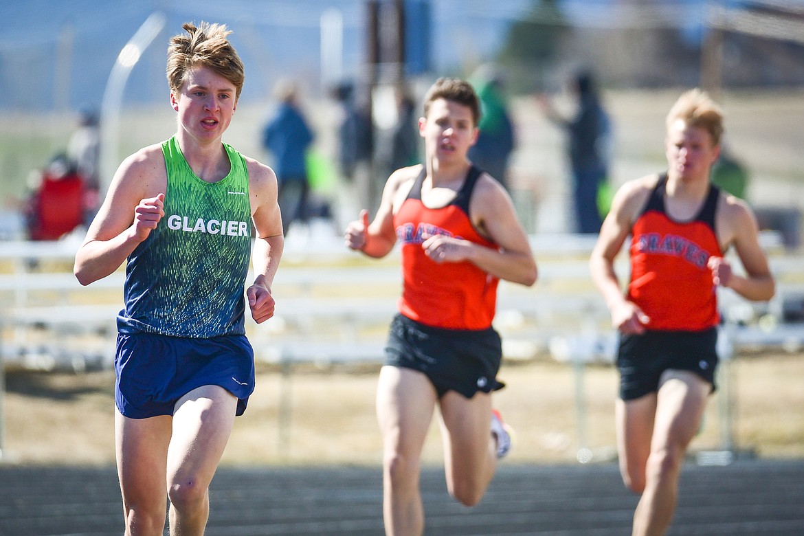 Glacier's Sam Ells leads the boys 1600 meter run during a crosstown track and field meet at Glacier High School on Tuesday, April 19. (Casey Kreider/Daily Inter Lake)