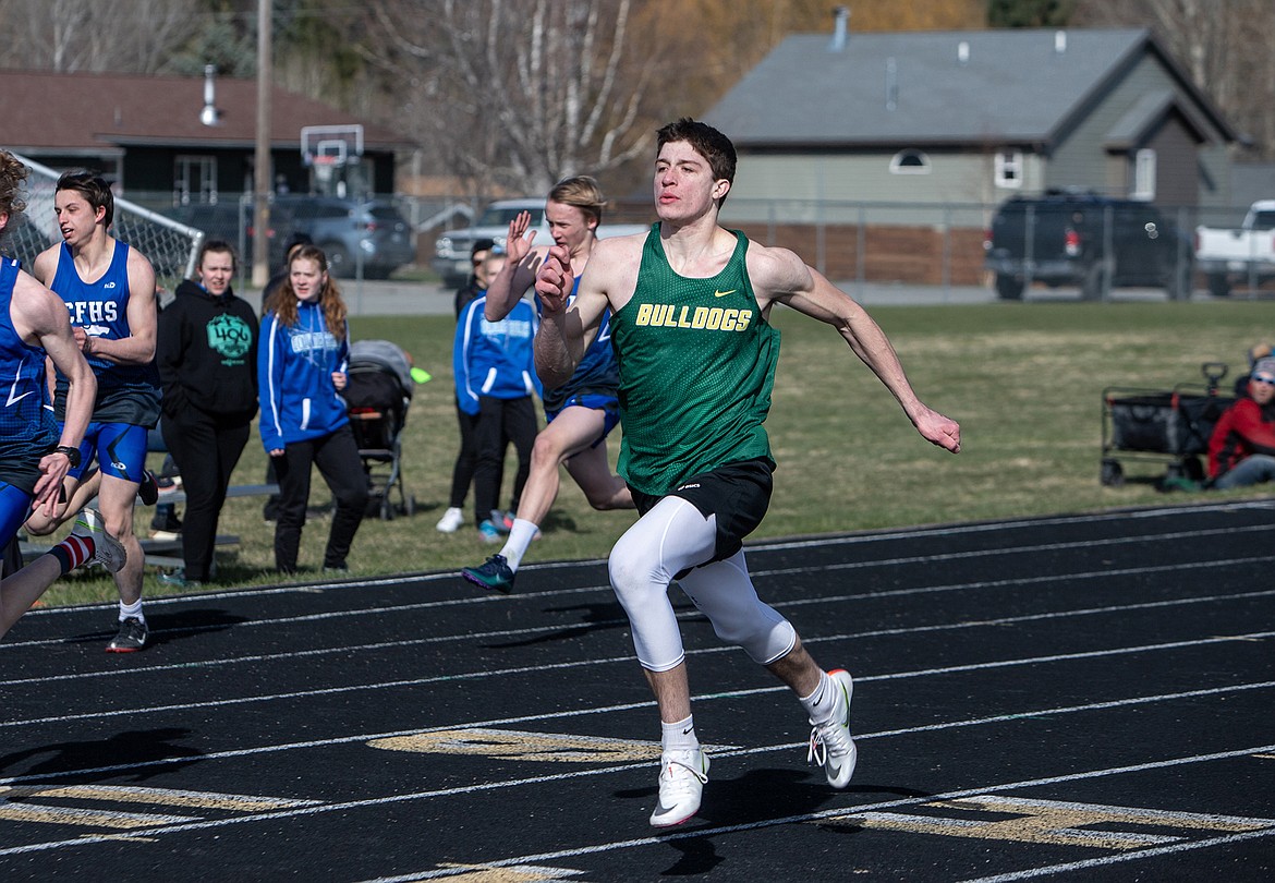 Whitefish runner Morgan Kyle competes in the Dog-Cat Dual track meet on Thursday at Whitefish High School. (JP Edge photo)