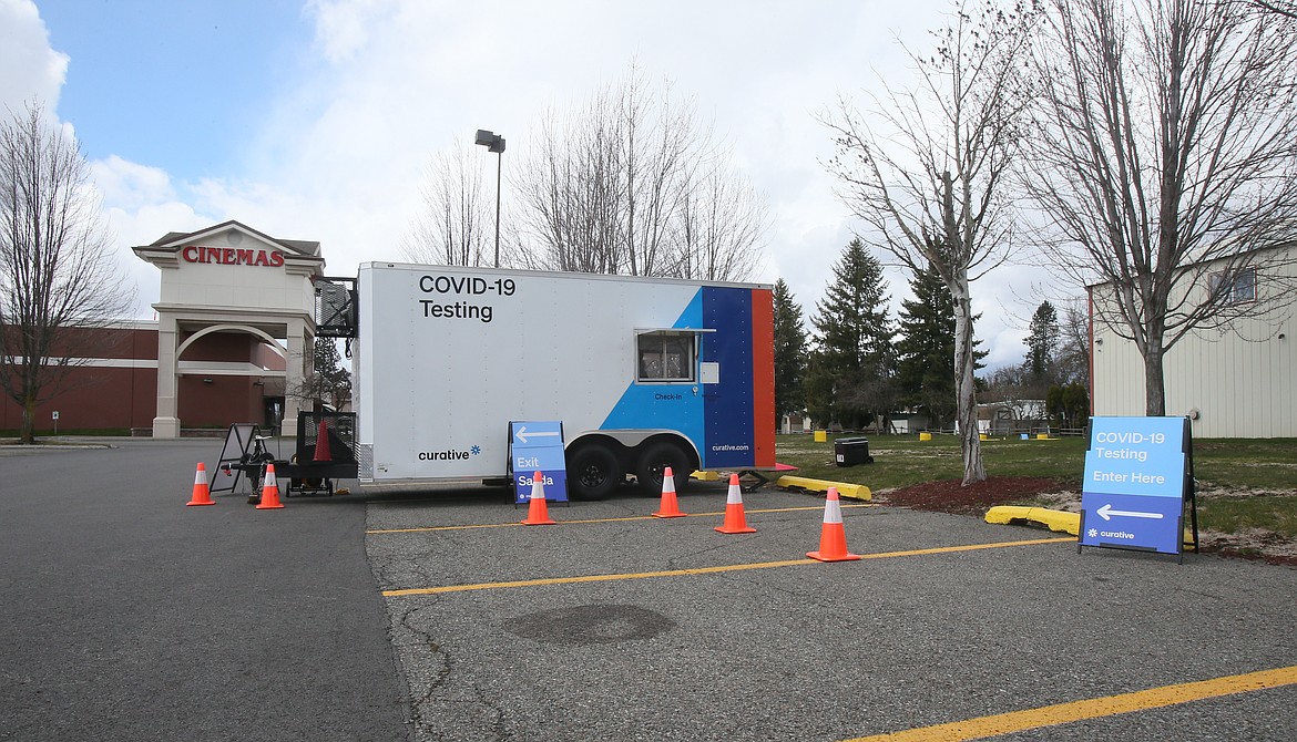 A white, blue and orange trailer between the Hayden Discount Cinema and the Hayden Library is public health service startup Curative's new COVID-19 testing site.