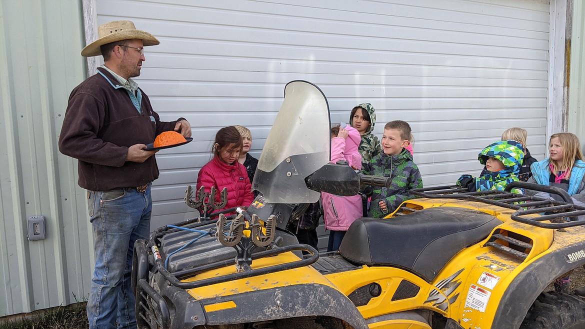 Josh Senecal uses a brain jello mold to make a point about the importance of four-wheeler safety, and what happens to the brain when your head hits something. (Courtesy of Susan Lake)