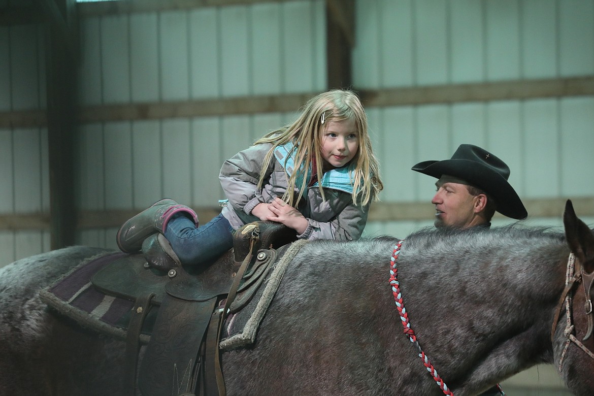 Neighbor Justin Marmon helped out with horse rides for the school kids. (Courtesy of Susan Lake)