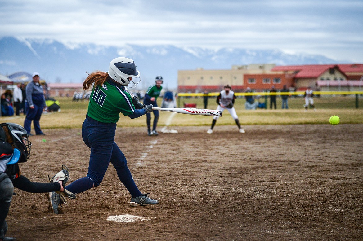 Glacier's Brooklyn Imperato (10) connects on a two-run single in the second inning against Flathead at Glacier High School on Thursday, April 21. (Casey Kreider/Daily Inter Lake)