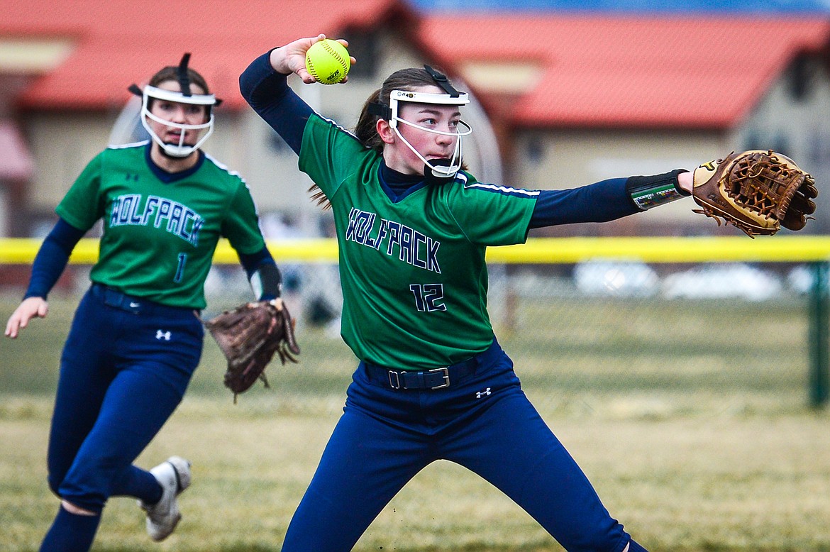 Glacier third baseman Ella Farrell (12) fires to first base in the second inning against Flathead at Glacier High School on Thursday, April 21. (Casey Kreider/Daily Inter Lake)