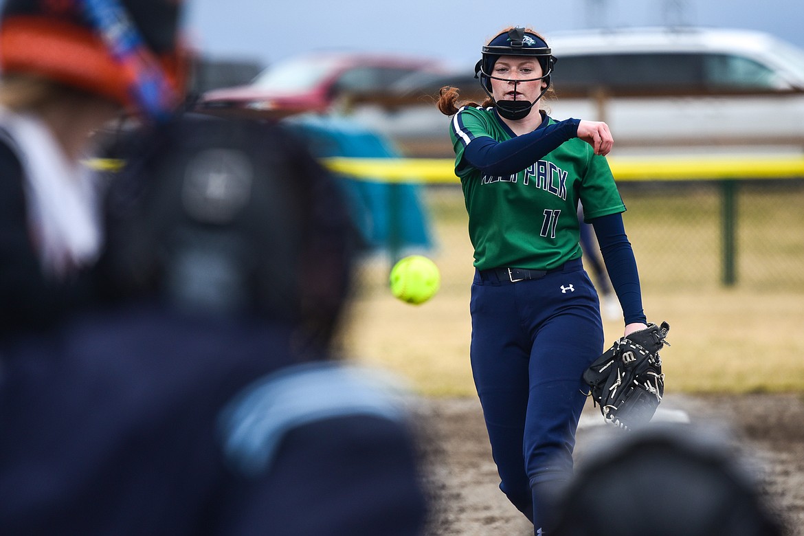 Glacier starting pitcher Alli Kernan (11) delivers to a Flathead batter in the first inning at Glacier High School on Thursday, April 21. (Casey Kreider/Daily Inter Lake)